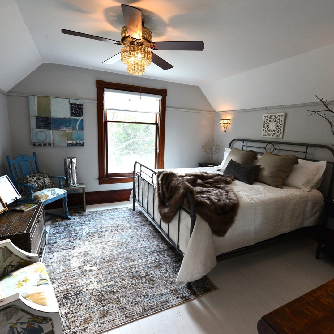 room outfitted in luxurious linens, custom bedding, thick towels and bathrobes.