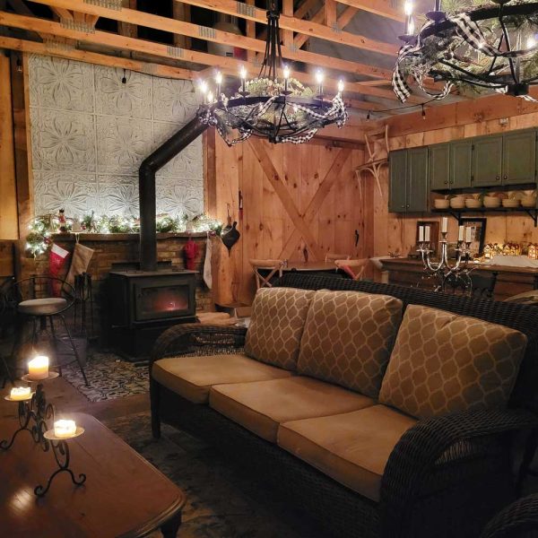 Couch by a wood stove in a chalet