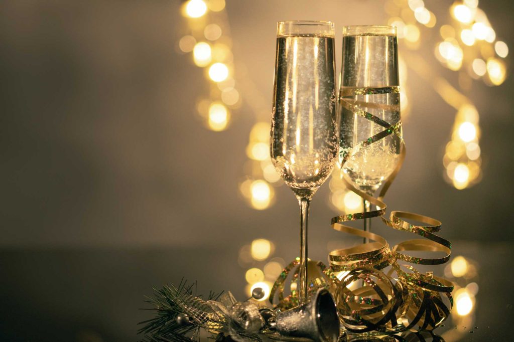 Wine glasses and twinkle lights